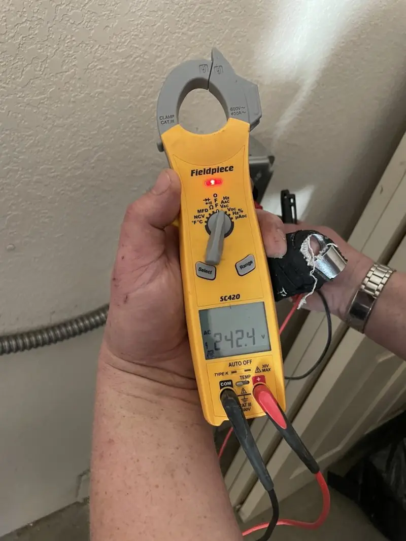 Voltage testing with clamp meter during Generator Installation in Roxboro